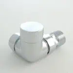 Shiny chrome radiator valve for heating system.