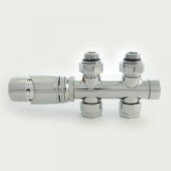 Shiny chrome radiator valve manifold with multiple connection points for heating systems.