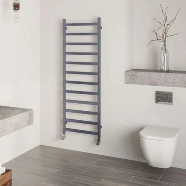 Heated towel rail radiator, modern bathroom decor, space-saving heating solution, stylish bathroom heater.