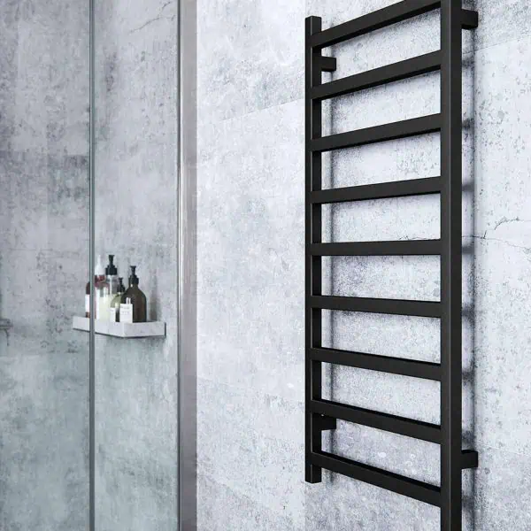 Wall-mounted black towel radiator for bathroom heating and drying.