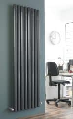 Tall modern vertical radiator for heating e space in contemporary interiors.
