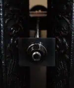 High-quality black prop with metal screw for photography or display purposes.