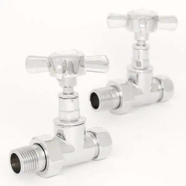 Shiny metal tap valves for plumbing or water control, close-up image.