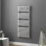 Polished chrome towel radiator for bathroom heating and drying. Modern, sleek design enhances bathroom decor. Durable and energy-efficient heating solution.