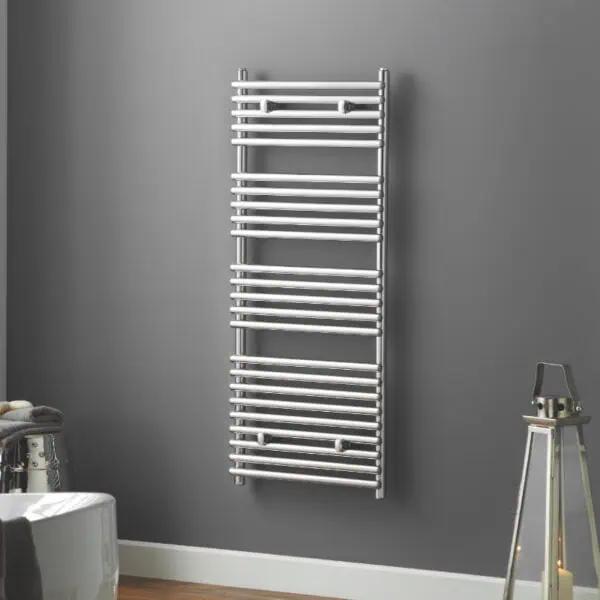 Polished chrome towel radiator for bathroom heating and drying. Modern, sleek design enhances bathroom decor. Durable and energy-efficient heating solution.