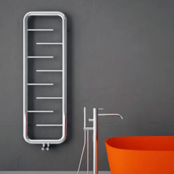 Modern heated towel rail and freestanding bathtub in a contemporary bathroom setup.
