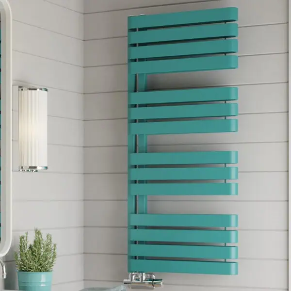 Modern teal towel radiator for bathroom heating and drying, styled on a white shiplap wall.