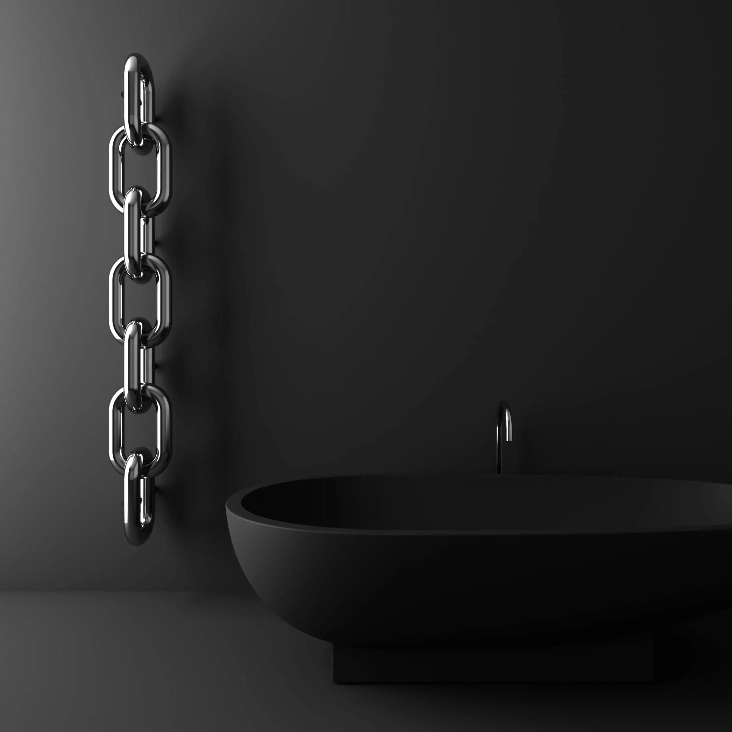 LINK-scaled Shiny metal chain hanging on a black wall next to a black sink with a faucet, modern industrial bathroom decor.