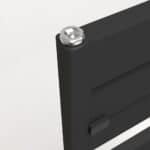 Screw in a black electronic device or battery pack with a silver screw head close-up.