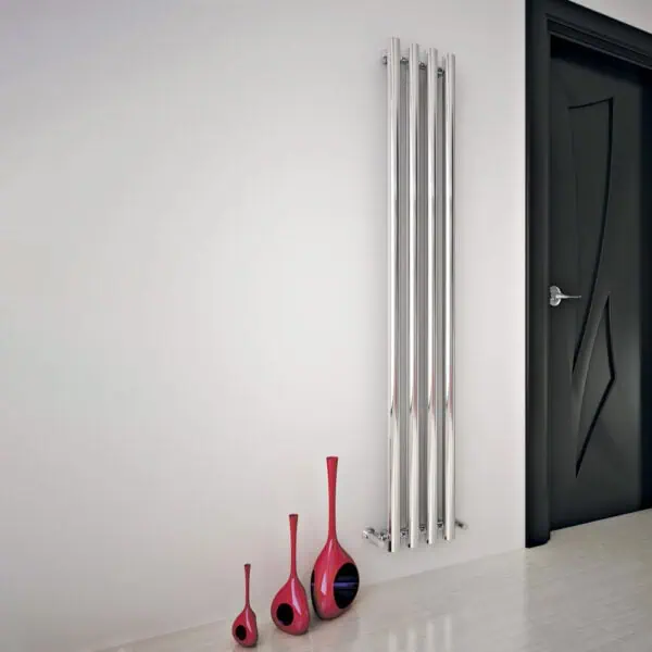 Stainless steel modern radiator in a contemporary home interior.