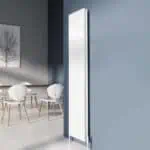 Contemporary white panel radiator in modern kitchen or dining room setting.