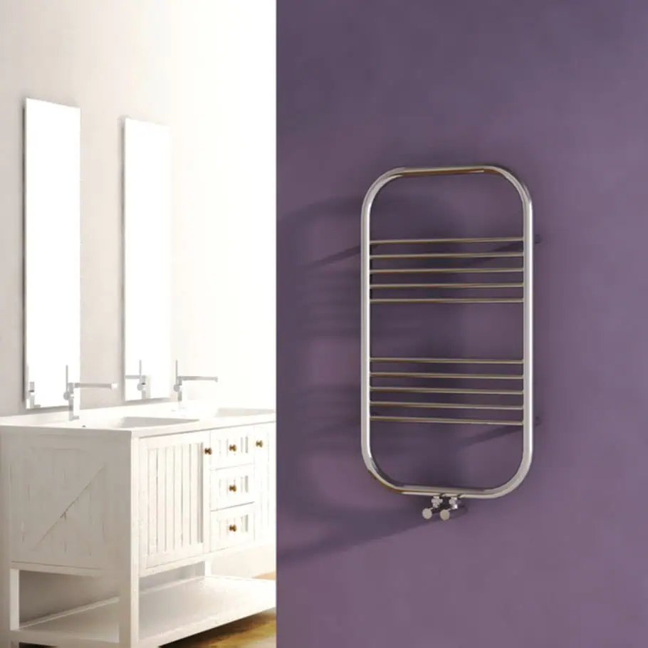 CARISA ELECTRA HEATED TOWEL RAIL Heated towel rail, modern bathroom radiator on purple wall, stylish home heating, towel warmer, bathroom decor.
