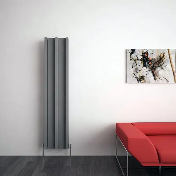 Vertical modern radiator in a contemporary living room, sleek design, and minimalist aesthetic.