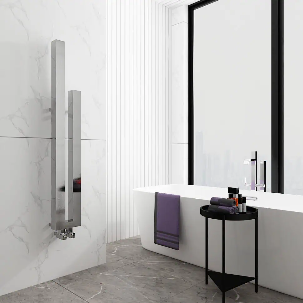 CARISA JACK VERTICAL Polished chrome towel rail for modern bathroom design.