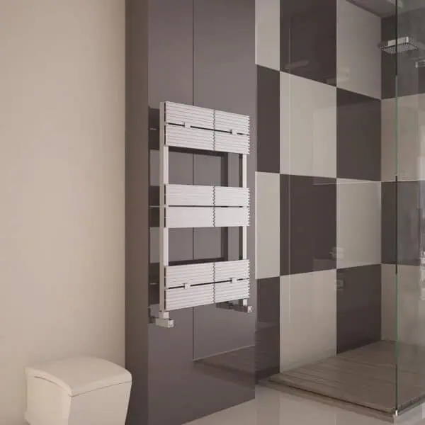 White modern towel radiator in contemporary bathroom decor with shower enclosure and checkered wall tiles.