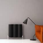 Modern black radiators with sleek design in contemporary home decor.