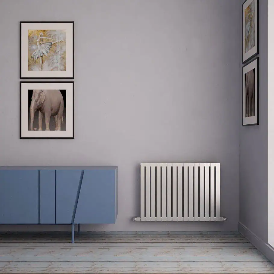 CARISA-SARP-600X810-STP Elegant interior with framed art and a modern radiator for contemporary home decor.