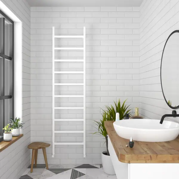 Modern bathroom with wooden vanity, white brick walls, and indoor plants for stylish home decor.