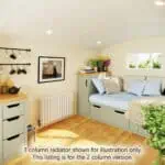 Cozy living space with built-in daybed, window, decorative plants, and vintage windmill artwork.