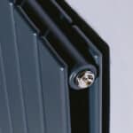 Precision industrial heating radiator with adjustable mounting bracket.