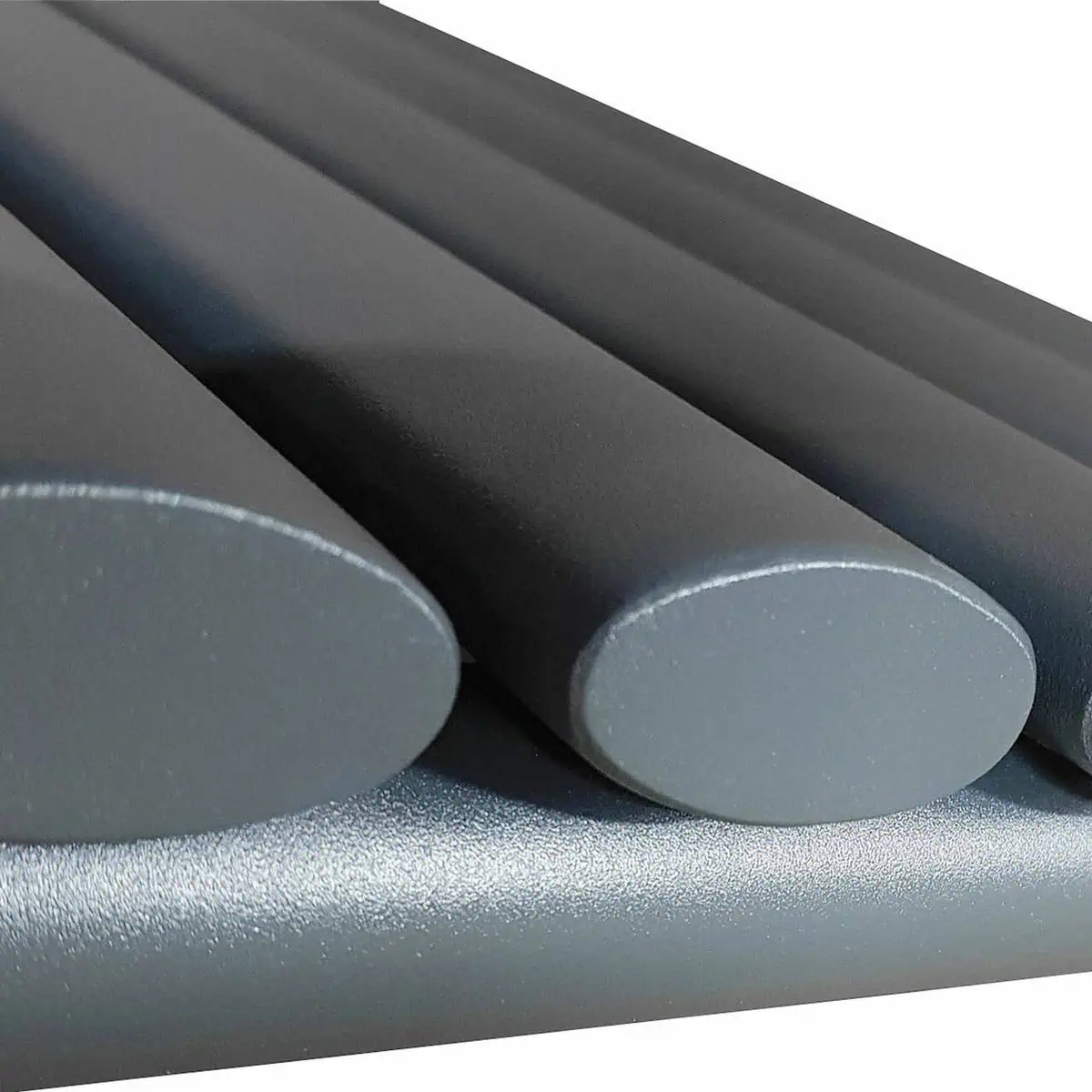 SİNGLE DETAY Gray cylindrical metal rods, sleek industrial design, possibly heat sinks or machine parts.