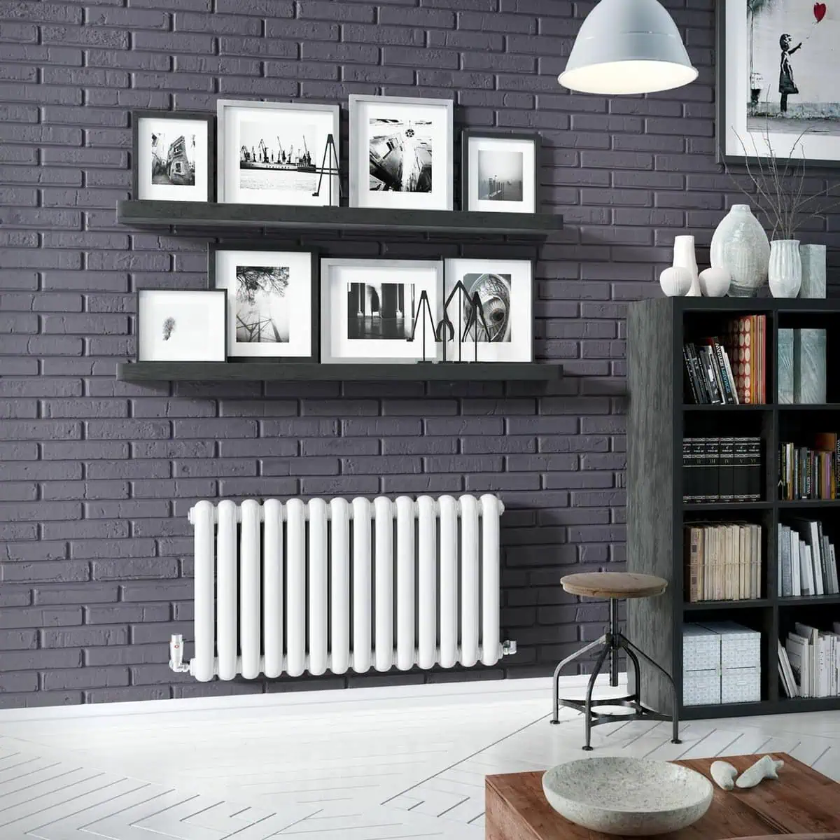 cassius horizontal Modern interior home decor with black and white framed photos on purple brick wall, stylish shelving and radiator, cozy living space design.