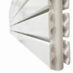 Radiator close-up with modern white design for efficient home heating.