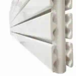 Radiator close-up with modern white design for efficient home heating.