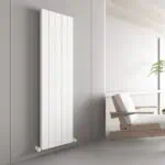 Minimalist white vertical radiator in a modern home interior.