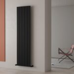 Black vertical radiator heater perfect for modern home decor.