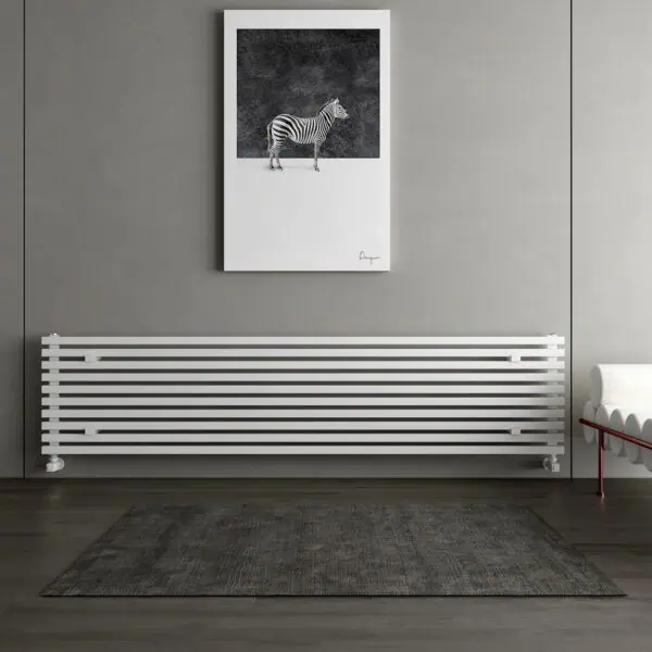 Shelf radiator in modern interior with zebra wall art and gray walls.