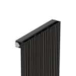 High-end black radiator with vertical slats for efficient heating and modern home decor.