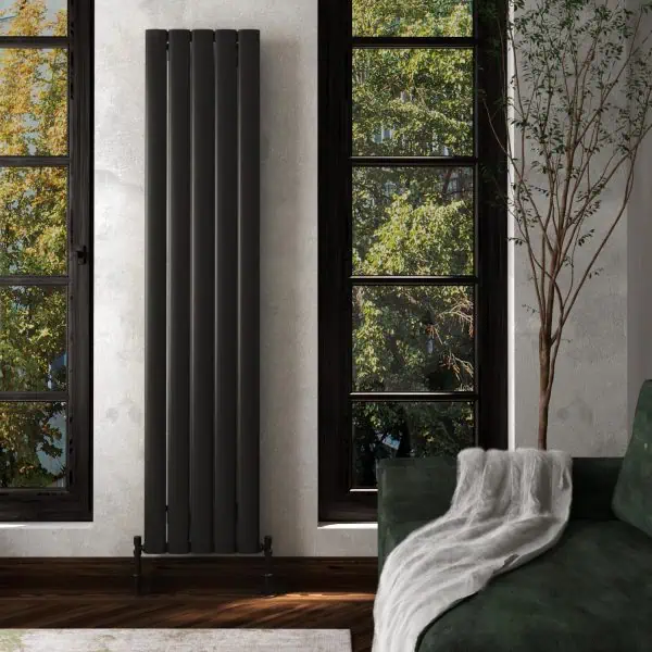 Modern black vertical radiator in a stylish interior setting.
