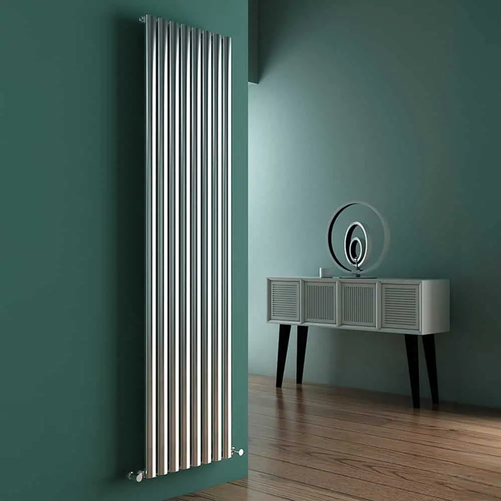 5 Radiator on a green wall in modern interior decor, part of Poshrads radiator collection in the UK.