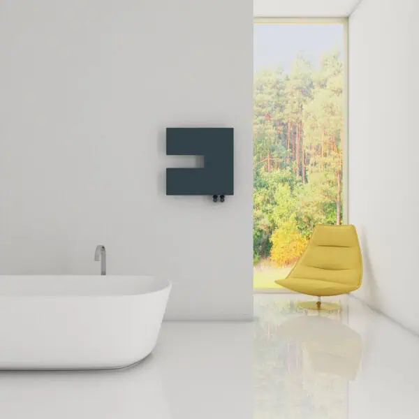 Modern bathroom with freestanding bathtub, black radiator, and yellow lounge chair in bright space with large window.