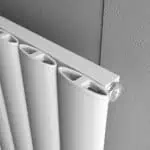 Aluminum radiator with a sleek, modern design ideal for efficient home heating.