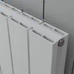 Radiator heating system for modern building interior.