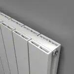 Radiator heating panel with modern slat design for efficient home heating.