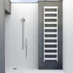 Modern outdoor shower with rain shower head and sleek design.