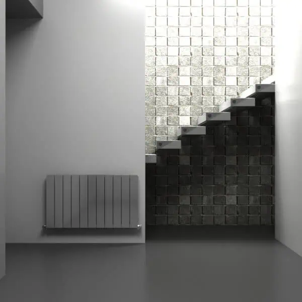 Modern minimalist interior with staircase and textured brick wall design.