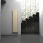 Radiator mounted on a wall in modern interior design.