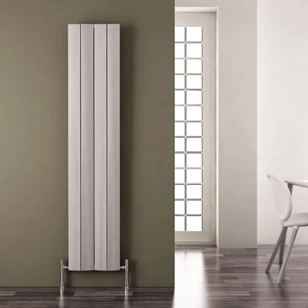 Radiator heating panel in modern interior, minimalistic home decor, wall-mounted vertical radiator for efficient heat distribution, stylish heating solution.