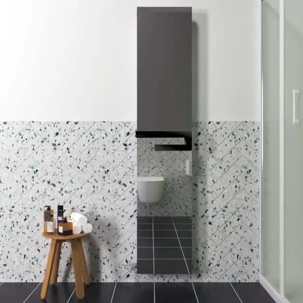 Sleek modern bathroom with terrazzo walls and minimalist black vanity unit.