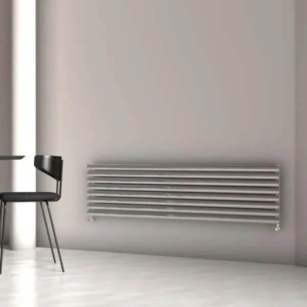 Contemporary wall-mounted radiator in a modern room environment showcasing stylish bathroom or heating solutions from Poshrads.