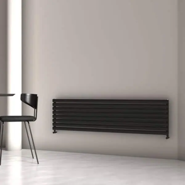 Radiator heating system in modern minimalist interior room, black wall panel radiator design, energy-efficient home heating, black radiator elegance, sleek heating solution.