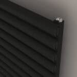 Black aluminum radiators for heating systems in modern homes.