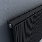 Modern black vertical radiator with a sleek design, ideal for contemporary heating solutions.