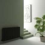 Radiator and staircase in minimal modern interior design, with potted plant and artwork.