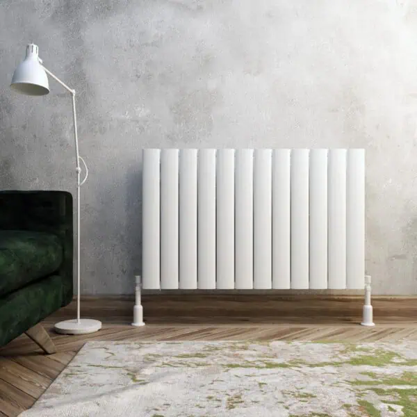 White modern radiator in a contemporary living room setting.