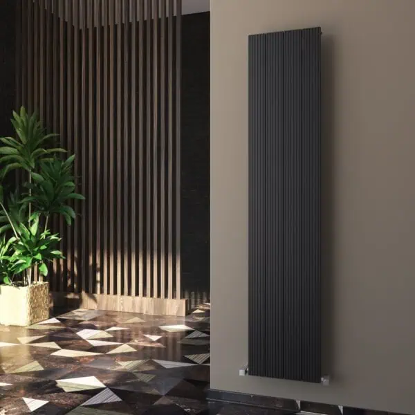 Stylish black vertical radiator in modern interior setting.